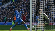 Brighton's English striker #18 Danny Welbeck scores their second goal during the English Premier League football match between Brighton and Hove Albion and Liverpool at the American Express Community Stadium in Brighton, southern England on March 21, 2026. (Photo by Glyn KIRK / AFP) 