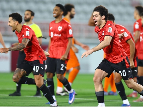 Al Rayyan players celebrate their victory against Umm Salal in the QSL Cup semi-final. 