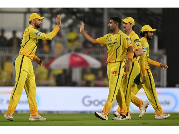 Chennai Super Kings' Indian cricket player Anshul Kamboj (2L) celebrates with teammates after taking the wicket of Rajasthan Royals' Indian player Vaibhav Suryavanshi during the 2026 Indian Premier League (IPL) T20 match between Rajasthan Royals and Chennai Super Kings at the Barsapara Cricket Stadium in Guwahati on March 30, 2026. (Photo by BIJU BORO / AFP) 