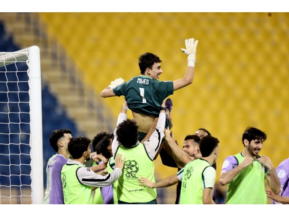Muaither's goalkeeper Majed Abdullatif is tossed in the air as players celebrate their win over Al Arabi in the semi-final.