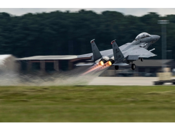 This handout photo provided by the US Air Force shows an F-15E Strike Eagle taking off for a training sortie at Seymour Johnson Air Force Base, North Carolina, on August 22, 2025. (Photo by Master Sgt. Alexandre Montes / US AIR FORCE / AFP)