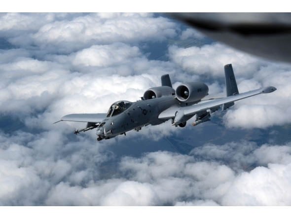 A US Air Force A-10 Thunderbolt II, also known as the Warthog, departs after receiving fuel in the skies near the border of Iowa and Missouri on July 7, 2020. (Photo by Senior Master Sgt. Vincent De Groot / US AIR FORCE / AFP) 