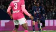 Paris Saint-Germain's French forward #10 Ousmane Dembele kicks the ball during the French L1 football match between Paris Saint-Germain (PSG) and Toulouse FC at the Parc des Princes stadium in Paris on April 3, 2026. (Photo by Anne-Christine Poujoulat / AFP)