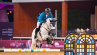 Qatari rider Bassem Mohammed guides Wathnan Zodiak over a fence during the CSI5* 145cm event.