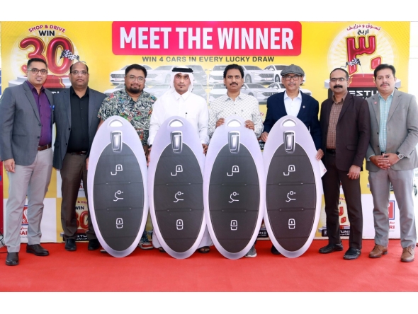 Safari Hypermarket hands over the cars to the winners of the third raffle draw.