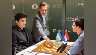 President of the Qatar Chess Federation Mohammed Al-Mudahka makes the ceremonial first move during the match at the Candidates Championship in Cyprus.