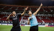 Al Sadd’s Paulo Otavio (left) and Roberto Firmino celebrate a goal during match against Al Sailiya. 