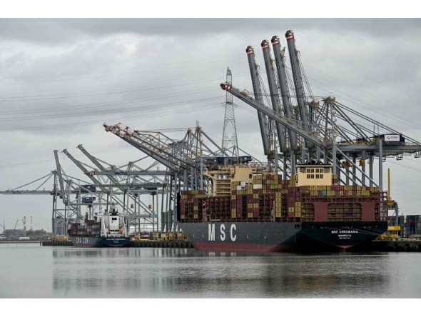 An MSC operated container ship is docked in a harbour basin in Europe's second-largest port of Antwerp, northern Belgium, where shipping is largely halted following an oil spill at one of its docks, on April 10, 2026. Photo by NICOLAS TUCAT / AFP