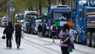 Trucks and tractors block O’Connell Street in the centre of the city, as protests continue for a third day against the rising cost of fuel due to the Middle East crisis, in central Dublin on April 9, 2026. (Photo by Paul Faith / AFP)
