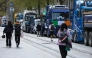 Trucks and tractors block O’Connell Street in the centre of the city, as protests continue for a third day against the rising cost of fuel due to the Middle East crisis, in central Dublin on April 9, 2026. (Photo by Paul Faith / AFP)
