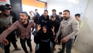 Family members arrive at the Al-Aqsa Martyrs Hospital in Deir al-Balah, where victims have been brought following an Israeli strike on the Al-Maghazi refugee camp in the central Gaza Strip on April 6, 2026. Photo by EYAD BABA / AFP
