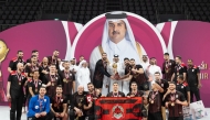 Olympic Council of Asia and Qatar Olympic Committee President H E Sheikh Joaan bin Hamad Al Thani presents the Amir Cup champions' trophy to Al Rayyan.
