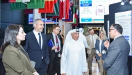 President of UDST Dr. Salem Al-Naemi interacts with experts at the forum. 