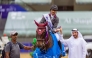 President of Regional Group VII of the International Federation for Equestrian Sports Sultan Mohammed Al-Yahyaei presents the trophy to Qatar’s Saad Ahmed Al Saad. 