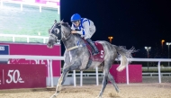 Marco Casamento guides Ghanem to Rodat Al Maida Cup victory at Al Rayyan Racecourse yesterday. PIC: Juhaim/QREC 