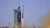 A Long March-4C carrier rocket carrying a satellite for high-precision greenhouse gas detection blasts off from the Jiuquan Satellite Launch Center in northwest China .Photo by Wang Heng/Xinhua
