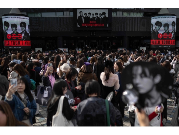 Fans of Korean boy band BTS arrive at Tokyo Dome before the start of the first BTS World Tour ‘Arirang’ in Tokyo on April 17, 2026. Photo by Andrew CABALLERO-REYNOLDS / AFP