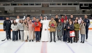 Ambassador of Korea H E Yun Hyunsoo and Ambassador of Japan H E Naoto Hisajima pose with embassy officials and staff at the Ali Bin Hamad Al Attiyah ice rink arena.