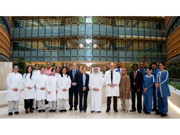Dr. Chiara Cugno (centre) with the Hematology and Oncology and GMP facility teams at Sidra Medicine. 