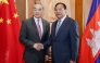 CAMBODIA-CHINA-DIPLOMACY
This handout photo taken and released by Agence Kampuchea Press (AKP) on April 23, 2026 shows Prak Sokhonn (R), Cambodian Deputy Prime Minister and Minister of Foreign Affairs and International Cooperation, shaking hands with China's Foreign Minister Wang Yi (L) during a meeting at the Ministry of Foreign Affairs in Phnom Penh. China's top diplomat Wang Yi is on a three-country tour of Southeast Asia this week, visiting Thailand and Myanmar after a first stop in Cambodia, Chinese officials said. (Photo by Handout / Agence Kampuchea Press (AKP) / AFP) 