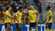 Al Nassr’s Kingsley Coman (centre) celebrates with Cristiano Ronaldo (right) during the semi-final.  