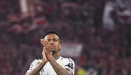 Real Madrid's Brazilian defender #03 Eder Militao greets the fans after the end of the UEFA Champions League quarter-final second leg football match between FC Bayern Munich and Real Madrid in Munich, southern Germany, on April 15, 2026. (Photo by Karl-Josef HILDENBRAND / AFP)