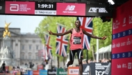 Kenya's Sabastian Sawe crosses the line to win the men's race in a new world record time at the 2026 London Marathon in central London on April 26, 2026. Photo by JUSTIN TALLIS / AFP