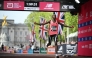 Kenya's Sabastian Sawe crosses the line to win the men's race in a new world record time at the 2026 London Marathon in central London on April 26, 2026. Photo by JUSTIN TALLIS / AFP