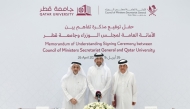 Minister of Justice and Minister of State for Cabinet Affairs H E Ibrahim bin Ali Al Mohannadi, Secretary General of the Council of Ministers Hamad bin Ahmed Al Muhannadi and President of Qatar University Dr. Omar bin Mohammed Al Ansari during the signing of the agreement.