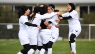 AFGHANISTAN-WOMEN-FIFA
Members of the Afghanistan's national women's football team playing under the Melbourne Victory Afghan women. (Photo by William WEST / AFP)  