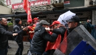 TURKIYE-POLITICS-SOCIAL-LABOUR-MAY DAY-DEMO
Turkish police and protestors scuffle during a May Day (Labour Day) rally, marking international Workers' Day, in Besiktas, a district of Istanbul, on May 1, 2026. 
(Photo by BERK OZKAN / AFP)