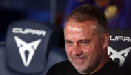 Barcelona's German coach Hans-Dieter Flick smiles before the Spanish league football match between FC Barcelona and RC Celta de Vigo at Camp Nou stadium in Barcelona on April 22 , 2026. (Photo by Josep LAGO / AFP