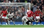 Manchester United's English midfielder #37 Kobbie Mainoo scores the team's third goal during the English Premier League football match between Manchester United and Liverpool at Old Trafford in Manchester, north west England, on May 3, 2026. (Photo by Darren Staples / AFP)