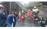 This handout picture released by the Cundinamarca Fire Department shows firefighters inspecting the site of an explosion at a coal mine in Sutatausa, Cundinamarca department, Colombia on May 4, 2026.
 Photo by Handout / Cundinamarca Fire Department / AFP