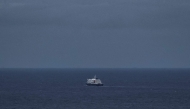 This general view shows the cruise ship MV Hondius, leaving the port of Praia, the capital of Cape Verde, on May 6, 2026. Photo by AFP