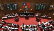 Taiwan's parliament members approve a 25 billion USD defence spending bill at Legislative Yuan chamber in Taipei on May 8, 2026. (Photo by I-Hwa Cheng / AFP)