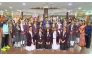 BPS Principal Dr. Anand R Nair, staffs with the school’s girls handball teams.