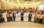 Officers from the Ministry of Interior and Officials from Shell Qatar with workers from companies.