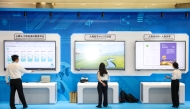 Exhibitors demonstrate products at an exhibition on achievements of global digital education held during the 2026 World Digital Education Conference in Hangzhou, east China's Zhejiang Province. (Xinhua/Jiang Han)
 