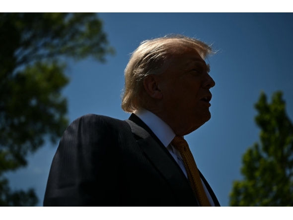 US President Donald Trump speaks to the press before walking to board Marine One as he departs from the South Lawn of the White House in Washington, DC, on May 12, 2026. (Photo by Kent Nishimura / AFP)
 