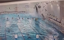A surveillance camera screenshot shows a car plunging into a swimming pool at a sports center in South Gyeongsang Province on Saturday. Photo credit: Gyeongnam Provincial Police via The Korea Herald