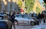 Police work at the scene after a driver injured seven people, two of them badly, when he drove on a sidewalk in Modena on May 16, 2026. (Photo by AFP) 