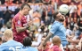 Roma's Italian defender #23 Gianluca Mancini heads the ball and scores his team's second goal during the Italian Serie A football match between Roma and Lazio at Olympic stadium in Rome on May 17, 2026. (Photo by Isabella BONOTTO / AFP)