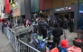 This photo taken on May 15, 2026, shows people camping out in line outside of the Swatch store in Times Square in New York, ahead of the May 16 release of the Audemars Piguet x Swatch Royal Pop watch. Photo by Timothy A. Clary / AFP
