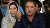 Parents of Pakistani TikTok influencer Sana Yousaf address the media after a verdict outside the court in Islamabad on May 19, 2026. (Photo by Farooq Naeem / AFP)