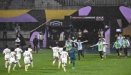 North Korea's Naegohyang Women's FC players celebrate after beating South Korea's Suwon FC Women in Suwon on May 20, 2026. (Photo by Pedro Pardo / AFP)
 