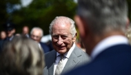 Britain's King Charles III attends a garden party at Hillsborough Castle in Hillsborough, Northern Ireland on May 20, 2026, on the second day of a three-day royal visit to Northern Ireland. (Photo by Henry NICHOLLS / POOL / AFP)
