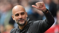 (FILES) Manchester City's Spanish manager Pep Guardiola waves to the fans ahead of the English FA Cup semi-final football match between Manchester City and Sheffield United at Wembley Stadium in north west London on April 22, 2023. (Photo by Glyn KIRK / AFP)