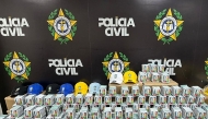 Handout picture released by Rio de Janeiro's Civil Police shows seized counterfeit Panini World Cup album stickers at the Civil Police headquarters, in Rio de Janeiro, Brazil on May 22, 2026. (Photo by Handout / RIO DE JANEIRO CIVIL POLICE / AFP)