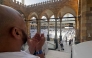A Muslim worshipper prays near the Kaaba, Islam's holiest shrine, at the Grand Mosque complex in the holy city of Makkah on May 22, 2026, ahead of the annual Hajj pilgrimage. (Photo by Zain JAAFAR / AFP)